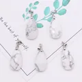 Faceted white turquoise teardrop stone pendants with silver clasps and marble veins - 13x25mm / Howlite