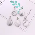 Five pieces of teardrop-shaped white turquoise stone pendants with silver metal clasps - 18x25mm / Howlite