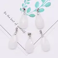 Five-piece set of white translucent teardrop stones with faceted diamond-cut and silver clasps - 13x25mm / White Jade