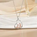 Silver heart necklace with rose gold girl and dog pendant featuring zircon accents - Girl and Dog (XL1088GB)