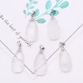 Faceted clear crystal water drop pendant set with silver bails on a decorative card - 13x25mm / Transparent Crystal