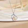 Silver heart necklace with 'Love you Mom' engraving and gold-plated mother-child relief - Mother and Daughter Interaction (XL1092GA)