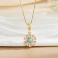 Detail of sunflower pendant with turquoise center and baguette zircon petals on gold chain - Sunflower Daisy Necklace (XL01262)