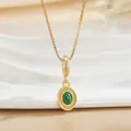 Close-up of gold-plated box chain necklace with green malachite pendant and zircon details - Oval Malachite Charm Necklace (XL01303)