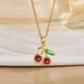 Elegant gold chain necklace with red cherry pendant featuring ruby-colored zircons - Purple Round Zirconia Cherry Style (XL01178)