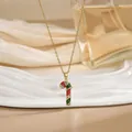 Détail du collier canne à sucre plaqué or avec émail rouge vert et strass brillants - Style Canne en Sucre Noeud (XL01572)