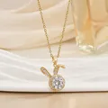 Detailed view of a golden rabbit pendant necklace with sparkling zircon stone setting - Rhinestone Cute Rabbit (XL01482)
