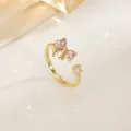 Golden open ring with pink heart zircon bow and clear crystal in elegant setting - Pink Bowknot with Round Stone (XL0327)