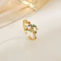 Detailed shot of gold-plated ring featuring colorful cubic zirconia and open design - Colorful Stone Plant Branch (XL0342)