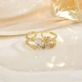 Bague double couche dorée de luxe avec pierres de zircone et détails en pierre de lune - Style Double Couche Étoilé Pierre de Lune (JZ0333)