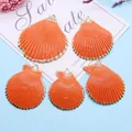 Cinq pendentifs coquilles Saint-Jacques oranges dorés pour création de bijoux DIY - Orange