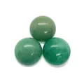Detailed view of three green natural stone cabochons with white engraved mystical symbols - 12mm / Green Aventurine