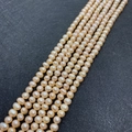 Strand of natural champagne pink freshwater pearls for DIY jewelry making and necklaces - 4-5mm / Pink
