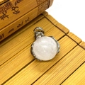 White crystal round stone pendant with silver claw setting on bamboo background - 19x28mm / White Crystal