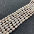 Natural freshwater pearl strand in iridescent pink finish for DIY jewelry making - Rice / Baroque / 4-5mm (13g) / Purple