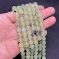 Cuentas de prehnita verde claro facetadas con inclusiones negras para pulseras DIY - Prehnita