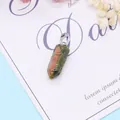 Polished Unakite stone hexagonal prism pendant with silver clasp on floral background - 9x28mm / Unakite