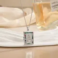 Religious book locket necklace with colorful crystals and Virgin Mary relief in silver finish - Silver Style (XL01793A)