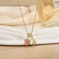Elegant gold titanium necklace with pink heart gem and diamond crescent moon pendants - Pink Heart Moon Style (XL01822)