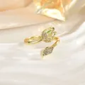 Detailed view of tulip open ring with green stone and micro-paved zircons on ceramic base - Green Teardrop Stone Style (JZ0470D)