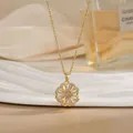 Detailed view of a gold rotating flower pendant necklace with white cubic zirconia - Hollow Flower Style (XL02152)