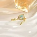 Detail macro view of tulip ring with blue gemstone and micro-inlaid zircon petals - Blue Tulip Style (JZ0471E)