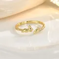 Macro shot of gold rabbit and carrot open ring with sparkling cubic zirconia inlay - Gold Rabbit Carrot Style (JZ0434)