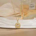 Close-up of golden sun pendant necklace with opal center and diamonds on silk - Cat's Eye Sun Shape Style (XL02160)