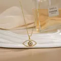 Detail of gold evil eye flower necklace with sparkling white zircons and boho chain - Bohemian Evil Eye Style (XL02176)