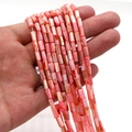 Perle cilindriche in conchiglia naturale rosa 4x8mm in filo tenuto nella mano - 4x8mm / N.7 Pesca