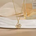 Elegant rotating flower pendant necklace in warm gold finish with micro-inlaid crystals - Windmill Four-Leaf Clover Pave Style (XL02188)