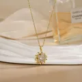 Rotating golden flower pendant necklace with shimmering white zircon stones - Double Layer Petal Rhinestone Style (XL02191)