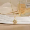Golden sunburst flower rotating necklace with cat eye stone and cubic zirconia - Sun Beam Cat's Eye Style (XL02192)