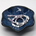 Flat round purple shell evil eye beads for DIY jewelry making in a blue ceramic bowl - 6mm Approx 63 Beads/Strand / No.3 Purple