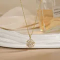 Elegant gold spinning sunflower necklace with sparkling zircon crystals on a fine chain - Sunflower Snowflake Radiating Style (XL02195)