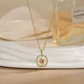 Golden spinning flower necklace with square frame and pink gemstone pendant - Rounded Square Octagram Style (XL02197)