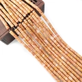 Vue macro détaillée de perles cylindriques en pierre de soleil 2x4mm pour bijoux DIY - Cylindre Entrelacé Ton Chaud (3) / 2x4mm