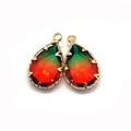 Waterdrop crystal pendant in green to red gradient with golden metal claw setting - US 14