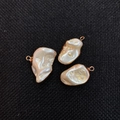 Set of three irregular baroque pearl pendants with gold-plated edges and metal loops - Light Yellow