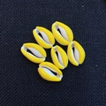 Set of six vibrant yellow and white cowrie shell charms with a high-gloss polished finish - Yellow