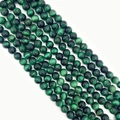 Strands of polished green tiger eye beads showing natural silk luster and chatoyant effect - 6mm / No.2 (Green)