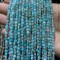 Vue macro de fils de perles en amazonite naturelle facettée et lisse bleu clair - 4mm 93pcs/Brin 7g / Aigue-marine