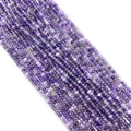 Macro detail of natural faceted purple amethyst beads for jewelry making and DIY projects - Amethyst