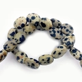 Ovale Dalmatische Jaspis kralen in crème met zwarte vlekken voor DIY-sieraden maken - 6x8mm (22 Stuks/Streng) / Dalmatijnse jaspis