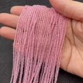 Pink faceted cat eye crystal beads 2mm to 5mm held in hand for jewelry making - Pink (No. 7)