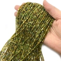 Faceted 2-4mm natural peridot beads for DIY jewelry making in vibrant olive green color - Taiwan Jade
