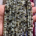 Cuentas de piedra semipreciosa tallada verde claro con inclusiones negras 2x3mm - 2x3mm 185 Cuentas/Tira 5g / Cuarzo Rutilado Negro