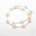 Perle a fiore di conchiglia bianca con centro arancione e tubi per gioielli fai-da-te - 12mm (0.5g) / Petalo Bianco Centro Arancione