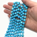 Faceted cylindrical turquoise beads with natural textures on a string for DIY jewelry - Turquoise