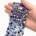 Faceted blue and white natural stone beads on a string for DIY jewelry making - Blue Sodalite